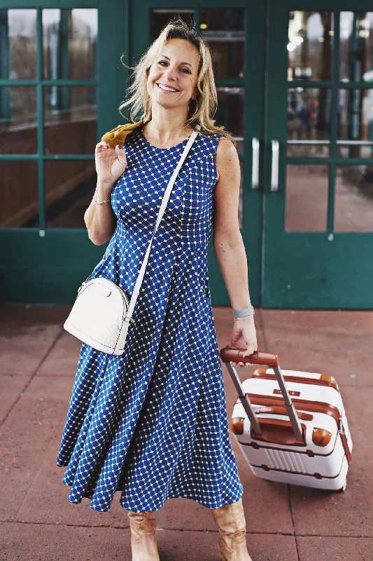 cleo-dress-navy-with-gold-cross-dots
