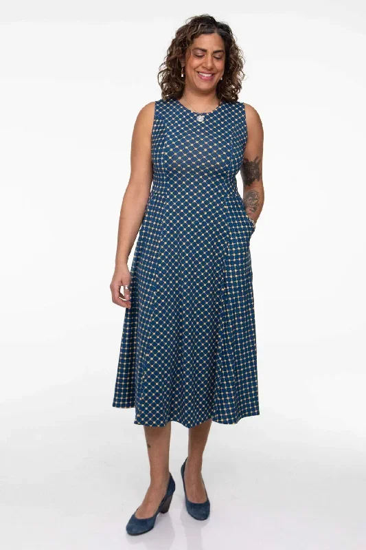 cleo-dress-navy-with-gold-cross-dots