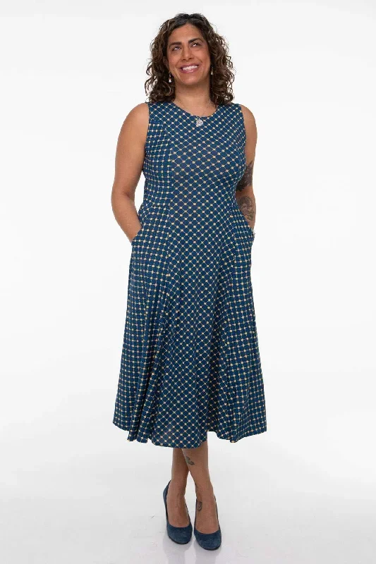cleo-dress-navy-with-gold-cross-dots